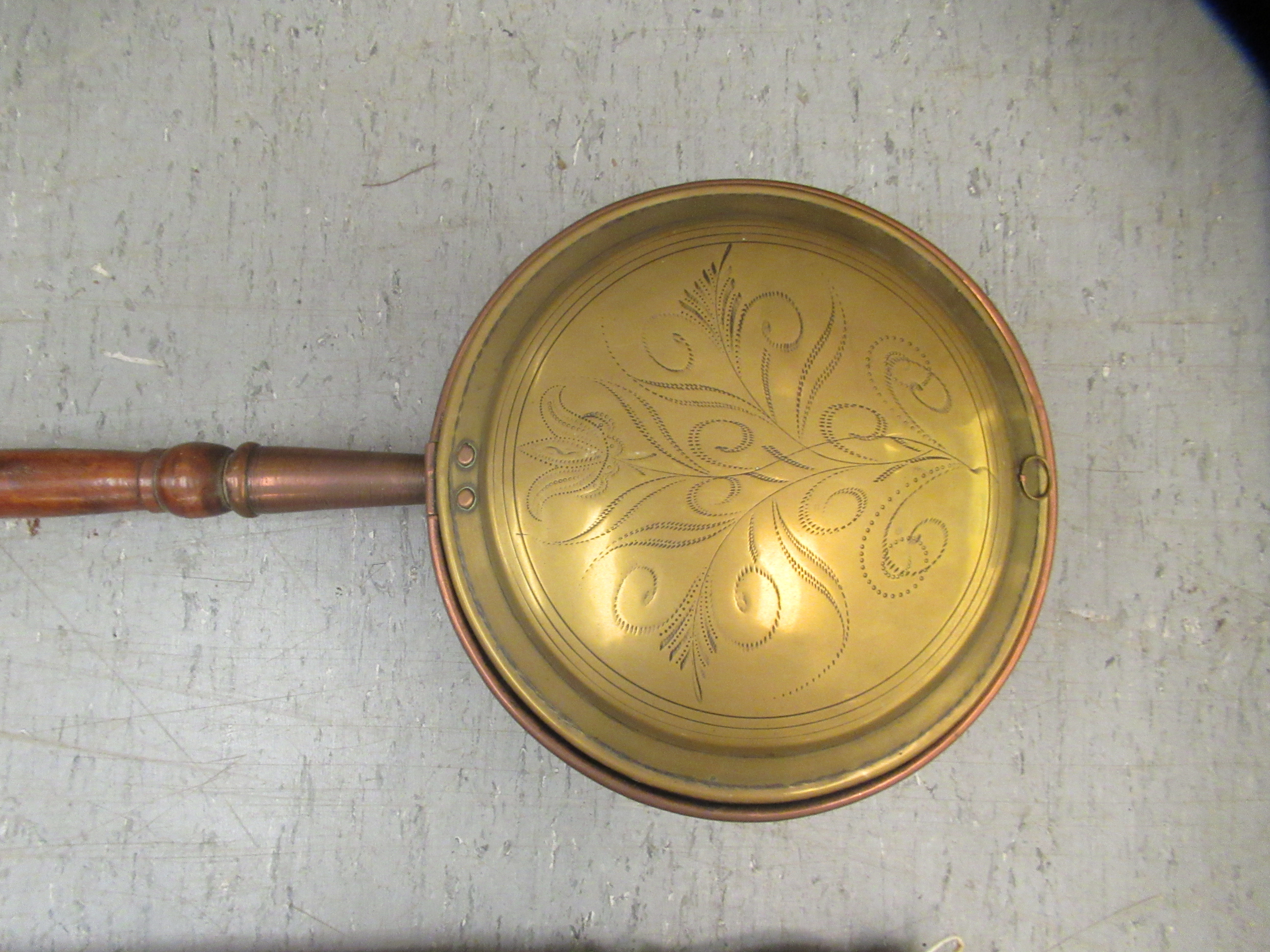 An early 19thC copper and brass warming pan with a scratch engraved design on the lid, on a turned - Image 3 of 3