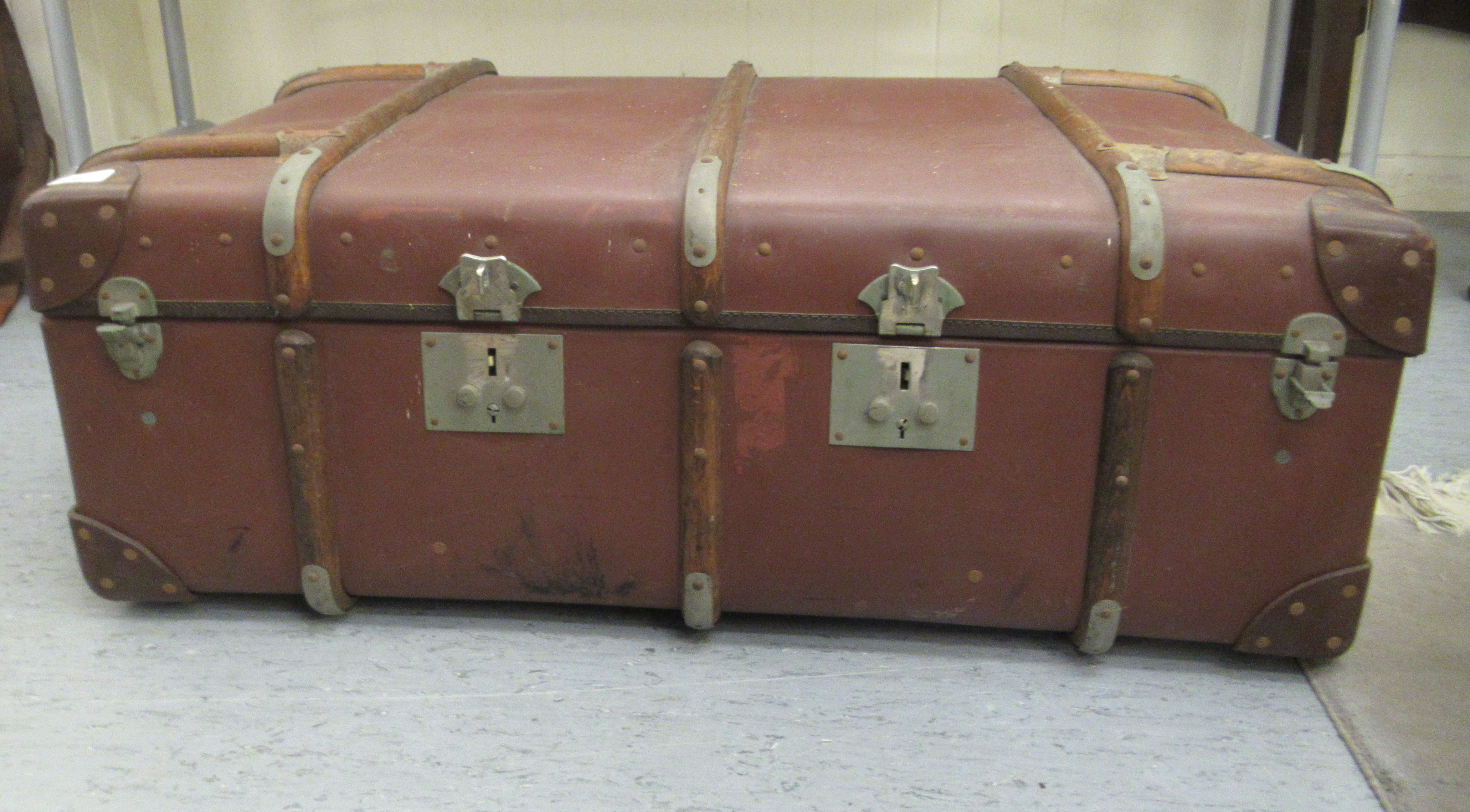 An early 20thC beech bound hide and canvas cabin trunk with a removable interior  12"h  28"w