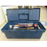 A toolbox, containing an assortment of tools