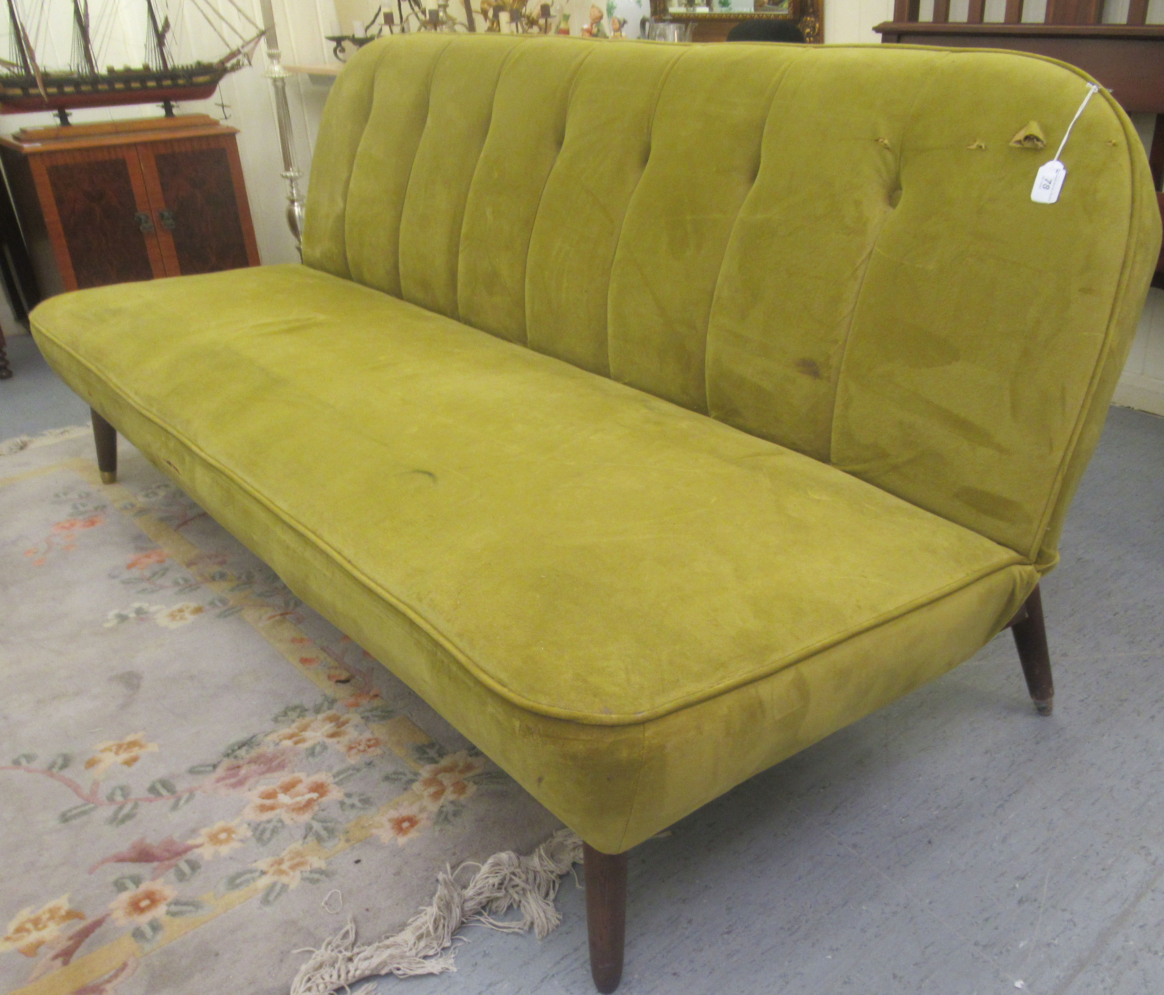 A vintage style lime green button upholstered four person settee, raised on teak tapered legs - Image 3 of 5