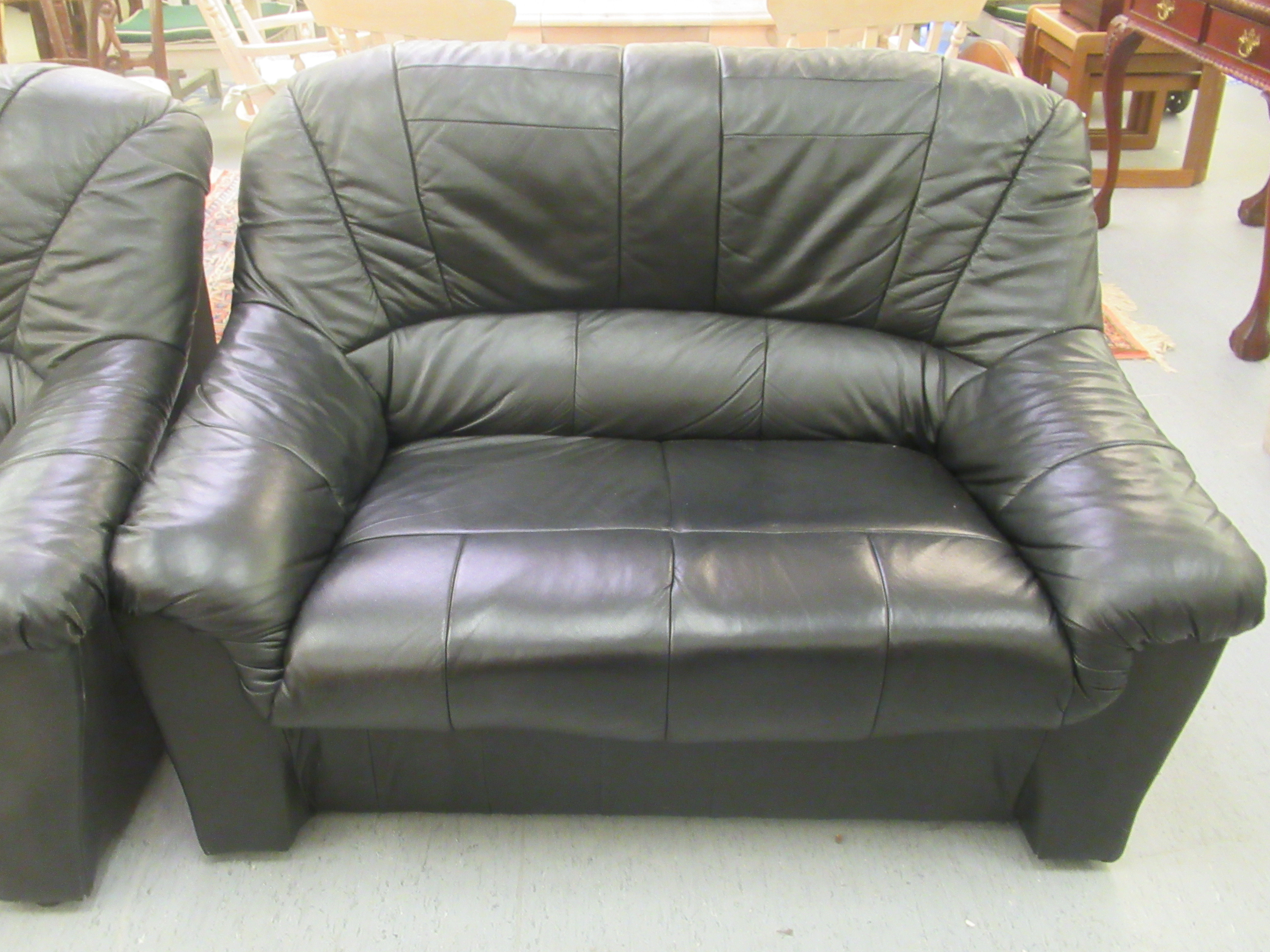 A pair of modern stitched black hide upholstered two person settees  52"w - Image 2 of 3