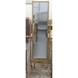 A modern gilt sprayed, antique inspired cheval mirror, raised on splayed feet  61"h  17"w