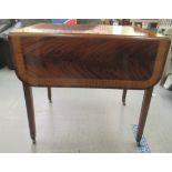 An Edwardian string, ebony and crossbanded mahogany Pembroke table with an end drawer and a
