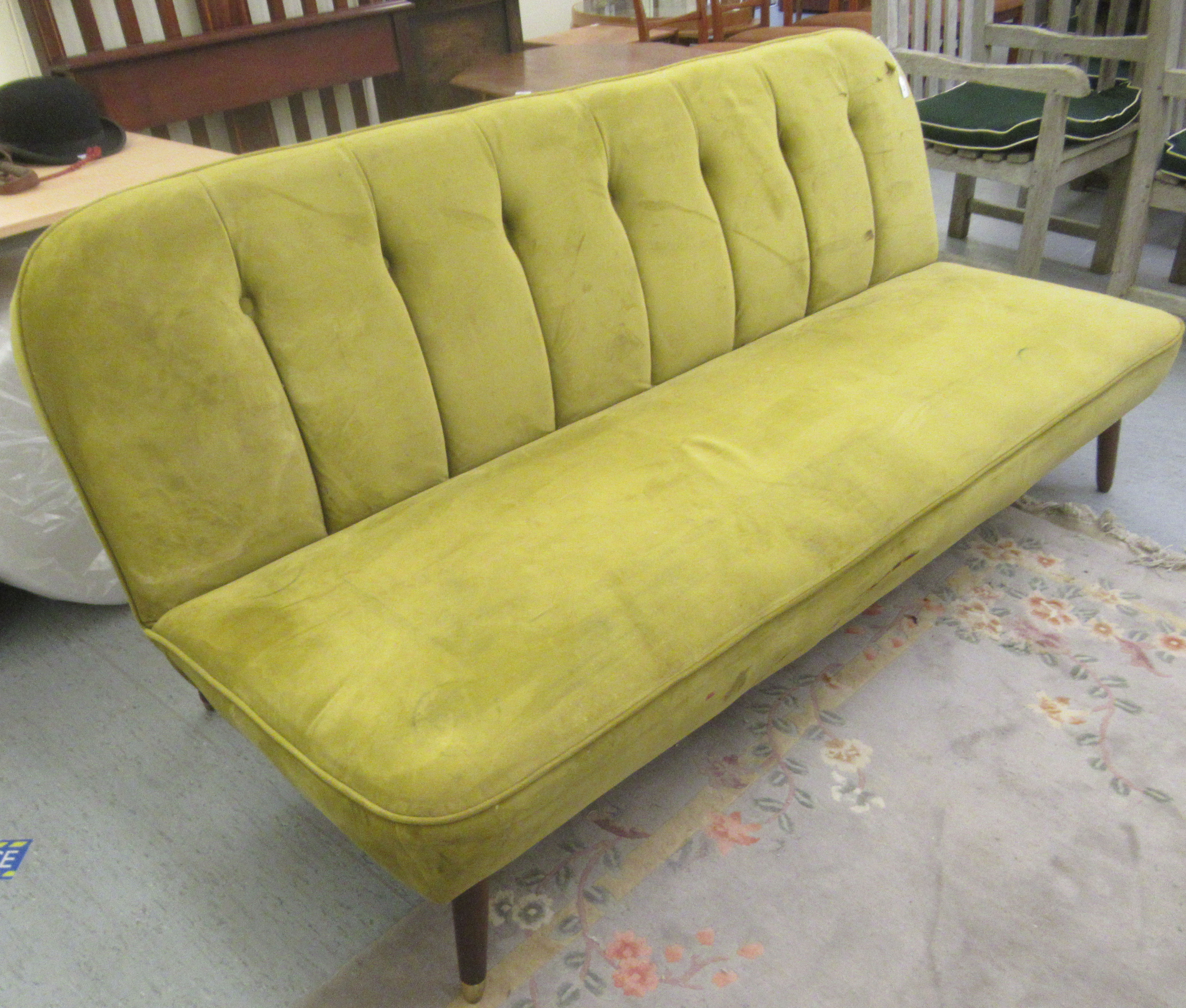 A vintage style lime green button upholstered four person settee, raised on teak tapered legs - Image 2 of 5