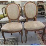 A pair of modern French inspired giltwood frame bedroom chairs, the fabric upholstered backs and