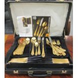 A canteen of 24ct gold plated and stainless steel bladed cutlery and flatware  cased