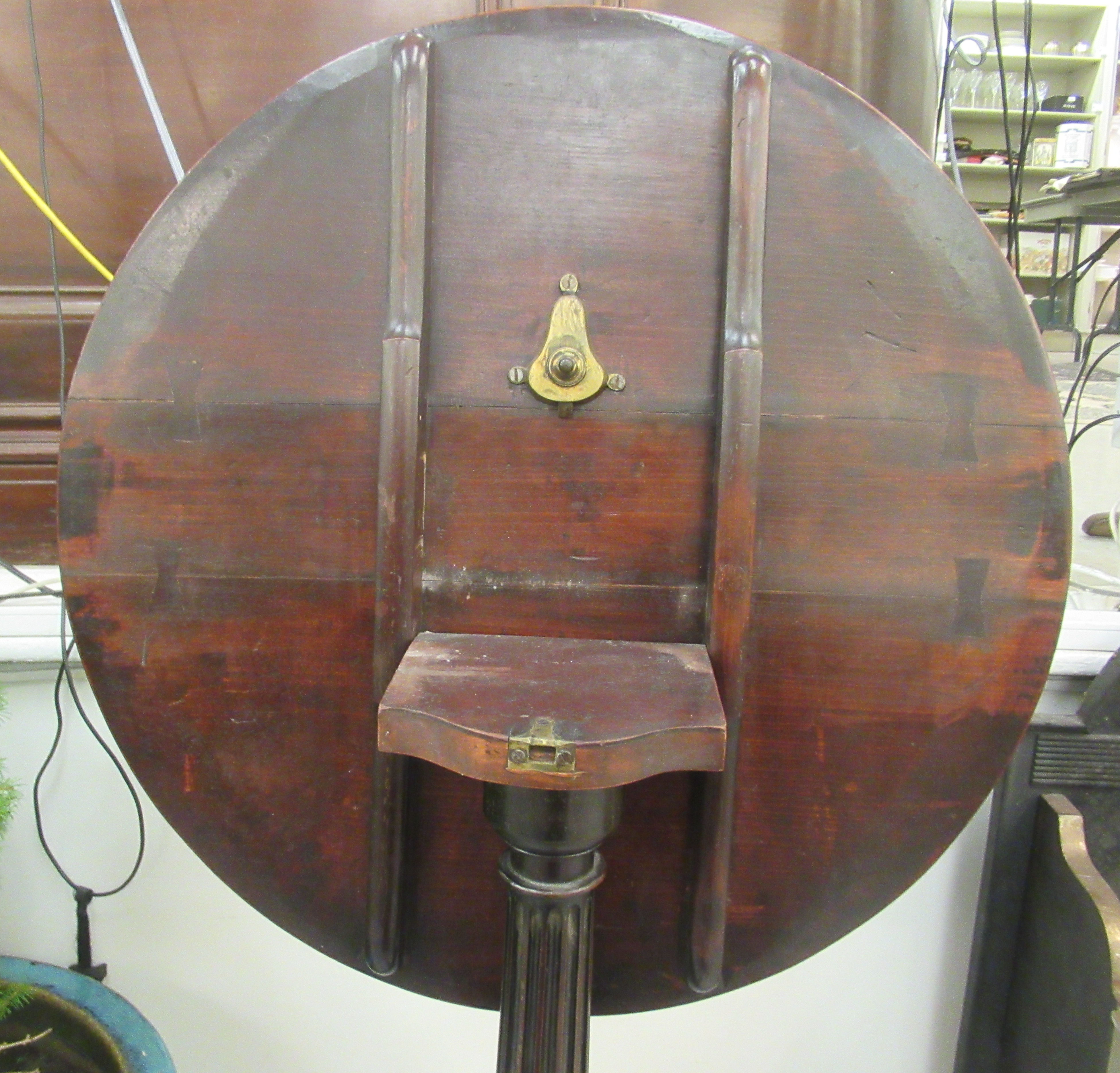 A Regency mahogany pedestal table, the tip-top over a fluted and reeded column, raised on scrolled - Image 4 of 4