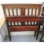 An Edwardian string and crossbanded mahogany single bed frame, the headboard  36"w