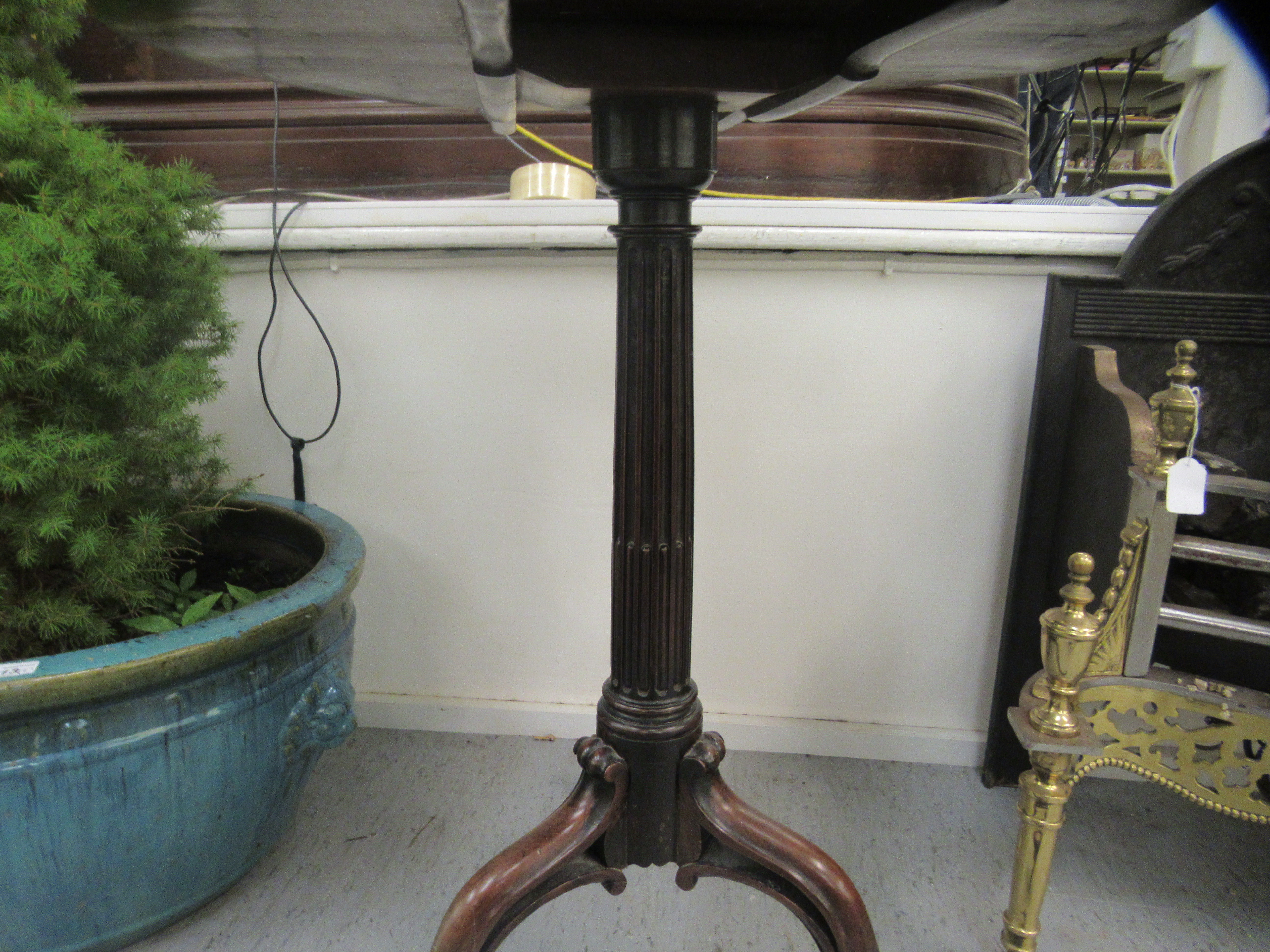 A Regency mahogany pedestal table, the tip-top over a fluted and reeded column, raised on scrolled - Image 3 of 4