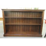 A 20thC oak open front three tier bookcase, on a plinth  44"h  67"w