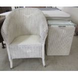 A Lloyd Loom style laundry bin  24"h  16"w; and a similar bedroom chair