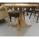 An early 20thC rustically constructed pine pedestal table  27"h  28"dia