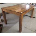 A modern (possibly Indonesian) teak dining table, the solid top raised on square legs  30"h  55"L