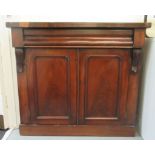 A mid Victorian mahogany chiffonier with a frieze drawer, over a pair of panelled doors, on a plinth