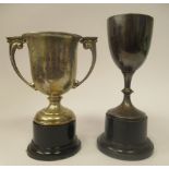 A silver twin handled pedestal trophy cup, on a plinth  Chester 1930  4"h; and a silver trophy