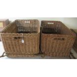 Two early 20thC woven cane laundry hampers with rope handles  19"h  36"w