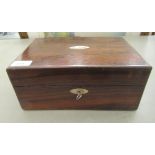 A William IV rosewood jewellery box with straight sides and a hinged lid, enclosing a later