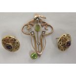 A 9ct gold Art Nouveau pendant; and a pair of gold coloured metal earrings