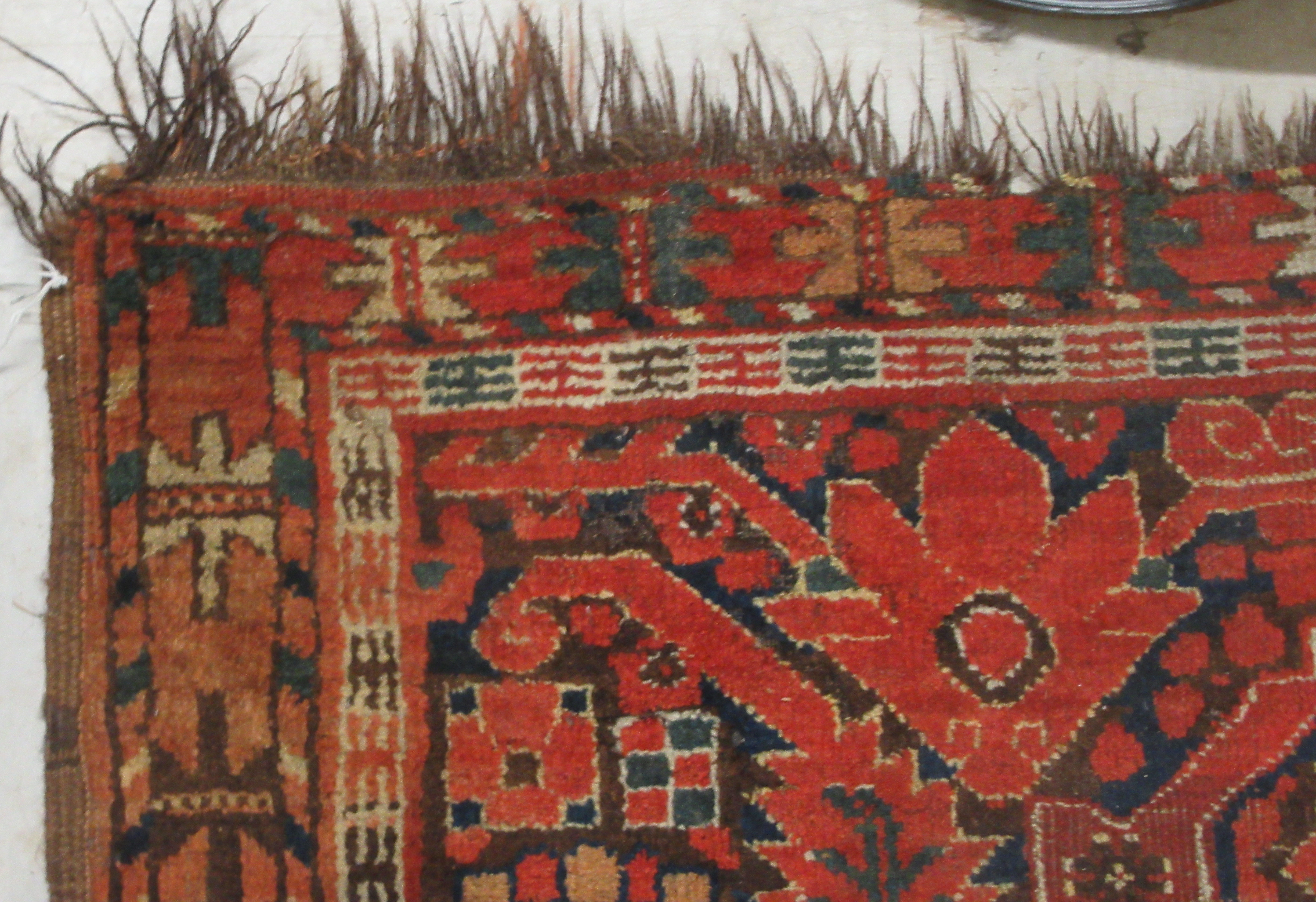 A Turkoman rug, decorated with repeating, stylised designs, on a red ground  97" x 50" - Image 3 of 5