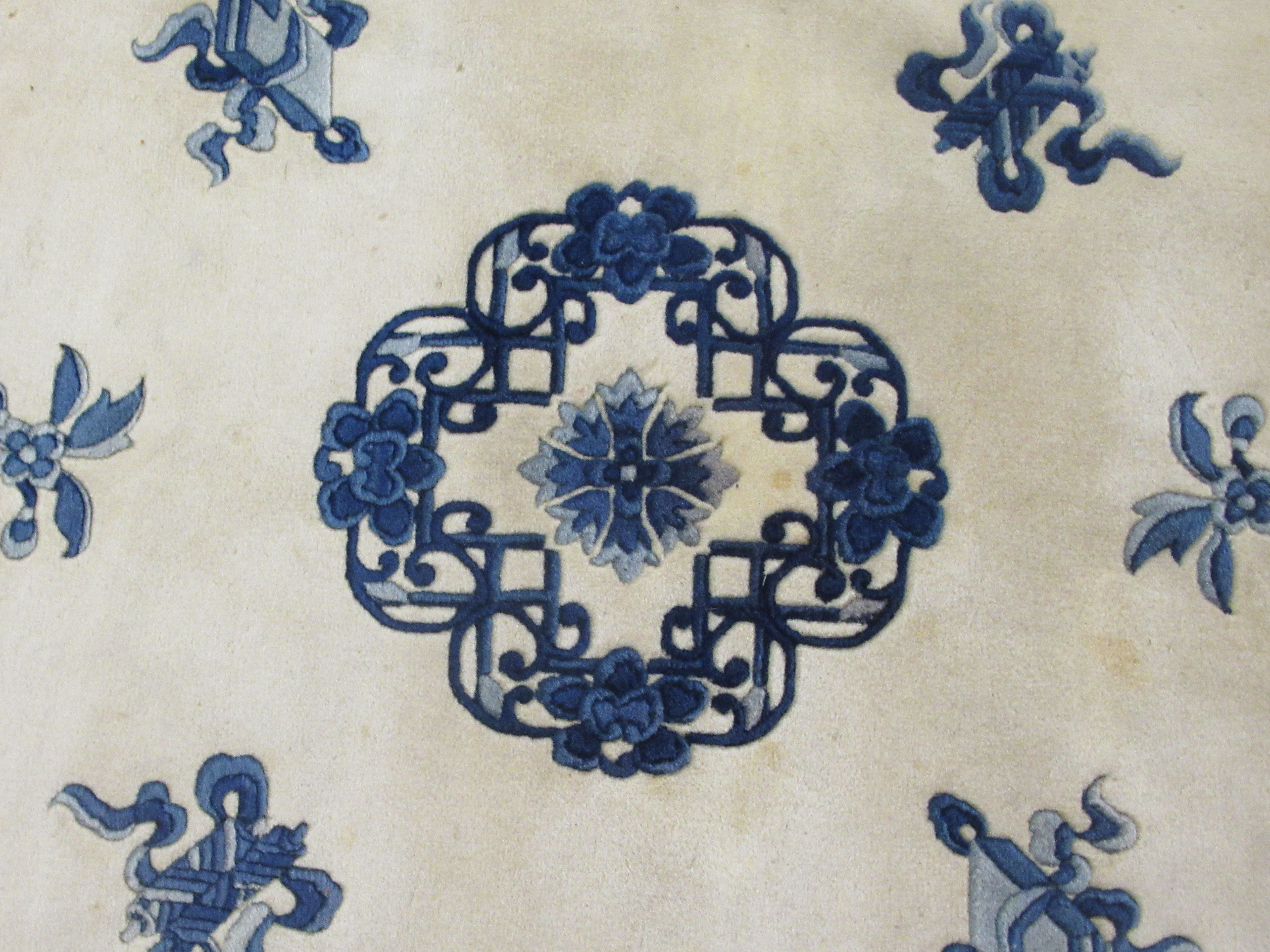 A modern Chinese washed woollen rug, traditionally decorated on a blue and white ground  48" x 76" - Image 2 of 5