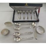 Silver collectables, viz. a bangle, two napkin rings and eleven spoons  mixed marks