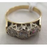 An 18ct gold ring, set with three diamonds