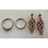 Items of personal ornament, viz. two 9ct gold rings; and a pair of gold coloured metal earrings