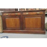 An Edwardian mahogany sideboard with two drawers and two cupboard doors, on a plinth  39"h  72"w