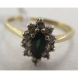 An 18ct gold cluster ring, set with emeralds and diamonds