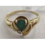 A 14ct gold emerald and diamond set ring
