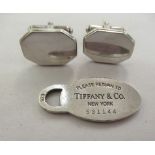 A pair of Tiffany & Co silver tablet link cufflinks, on folding bars; and a Tiffany silver tag '