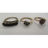 Two 9ct gold rings and another  stamped 18k, two set with coloured stones