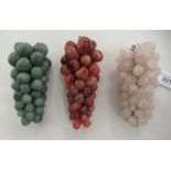 Three coloured hardstone ornaments, each fashioned as a bunch of grapes  6" - 8"h