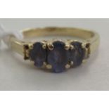 A 14ct gold tanzanite and diamond set ring