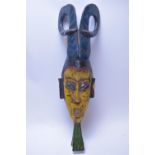 Carved African style wall mask.