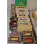 Corgi and other model buses and other vehicles.