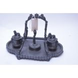 Victorian Britannia metal inkstand.