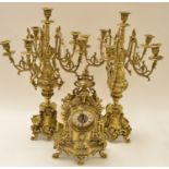 Brass mantle clock and garnitures