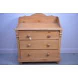 Stripped pine chest of drawers