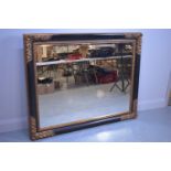 Large picture frame wall mirror.