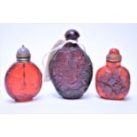 Three Chinese style snuff bottles.