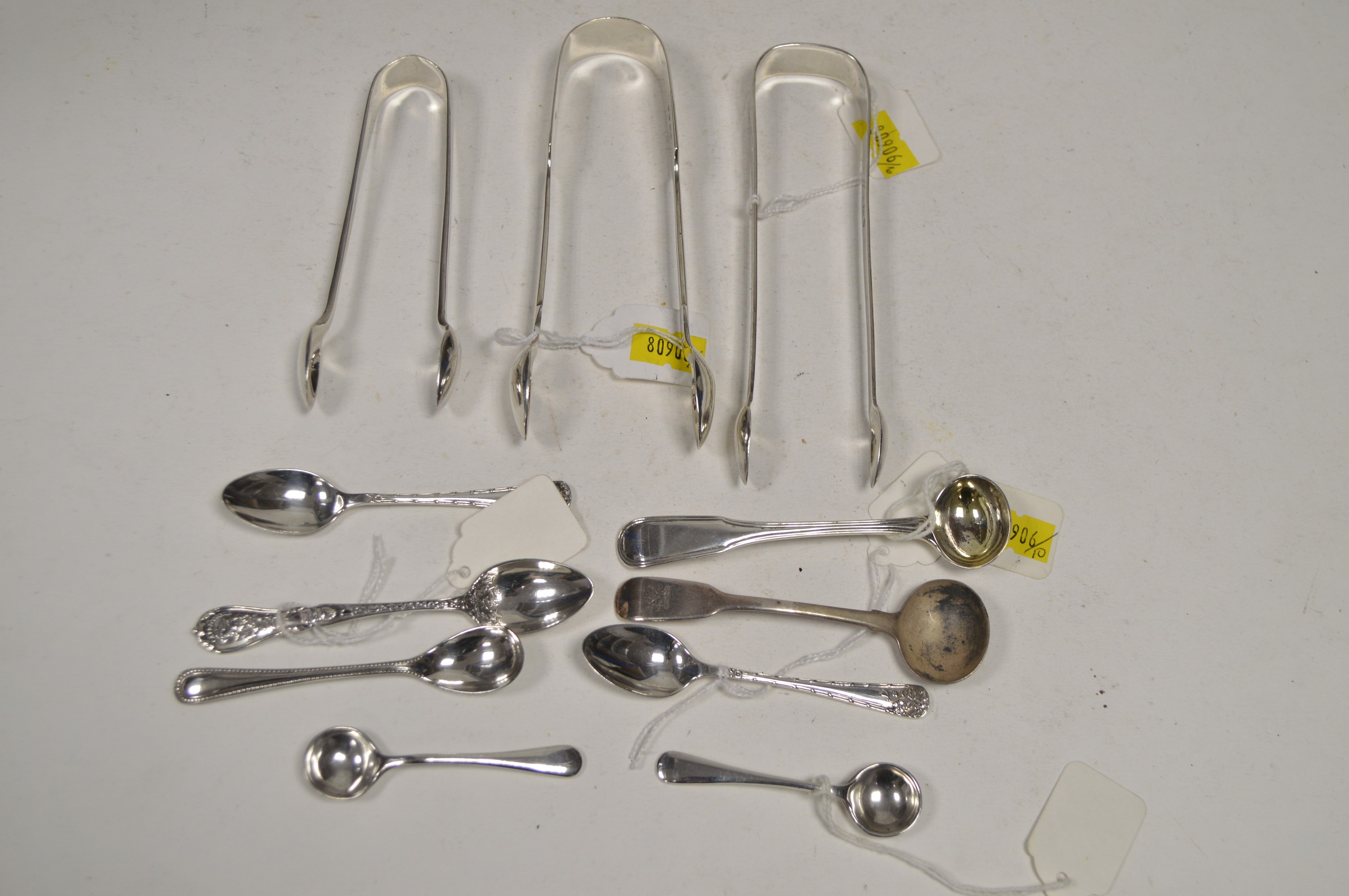 Silver tongs and spoons