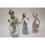 Three Nao figurines.