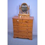 Modern pine chest of drawers; and a toilet mirror.