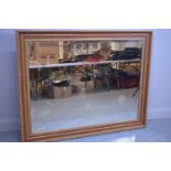 Large modern picture framed mirror.