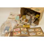 Cigarette cards, stamps and old pennies