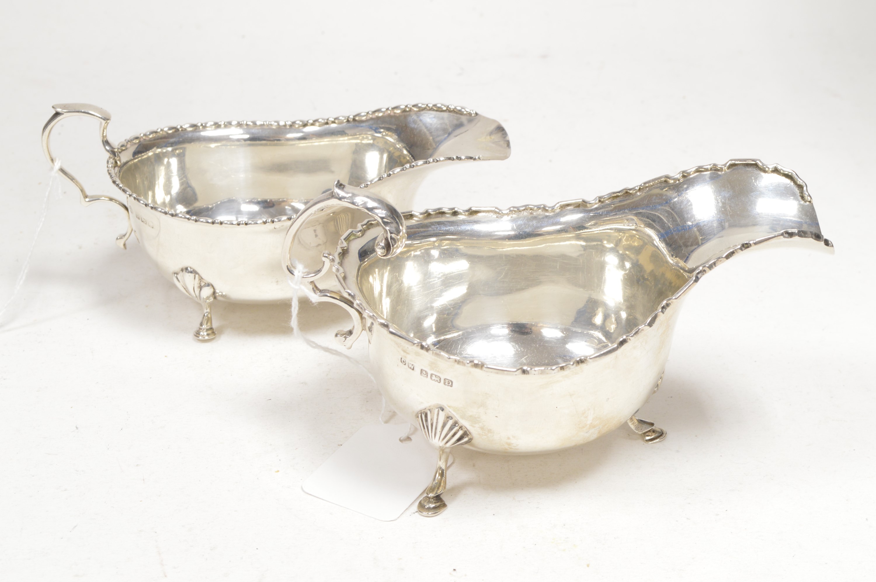 Two silver sauce boats