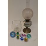 Paperweights, oil lamp and countertop container.