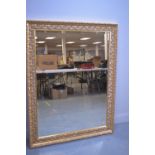 Large picture frame wall mirror.