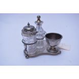 Late Victorian silver cruet stand and other items.